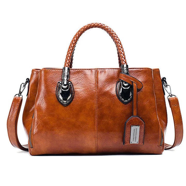 Pia® | Elegancka torba z plecionymi uchwytami