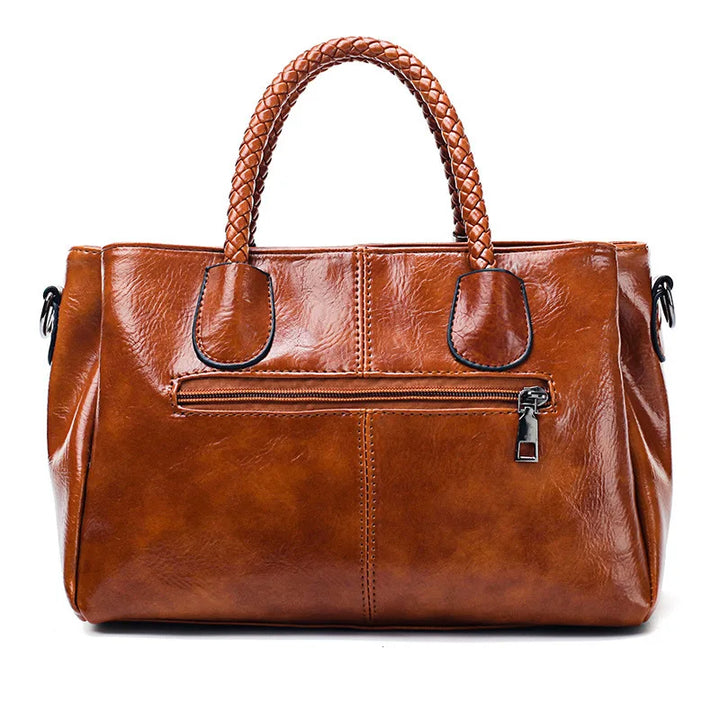 Pia® | Elegancka torba z plecionymi uchwytami