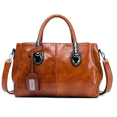 Pia® | Elegancka torba z plecionymi uchwytami